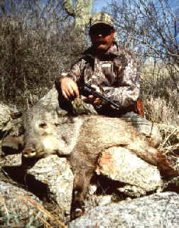 John Dickie with his handgun javelina