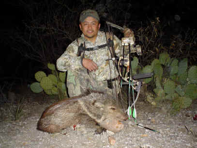 Chris Asuncion from Hawaii with an archery javelina.