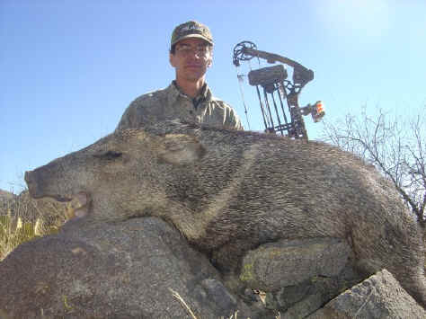 Dave Keiss with a javelina taken with his bow